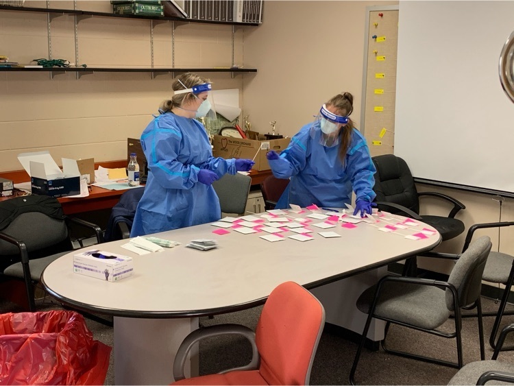Tyler Hosking and Breanna Owens help out with testing